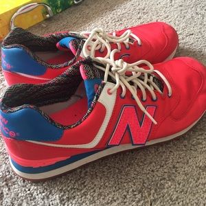 Red and Pink New Balance Shoes
